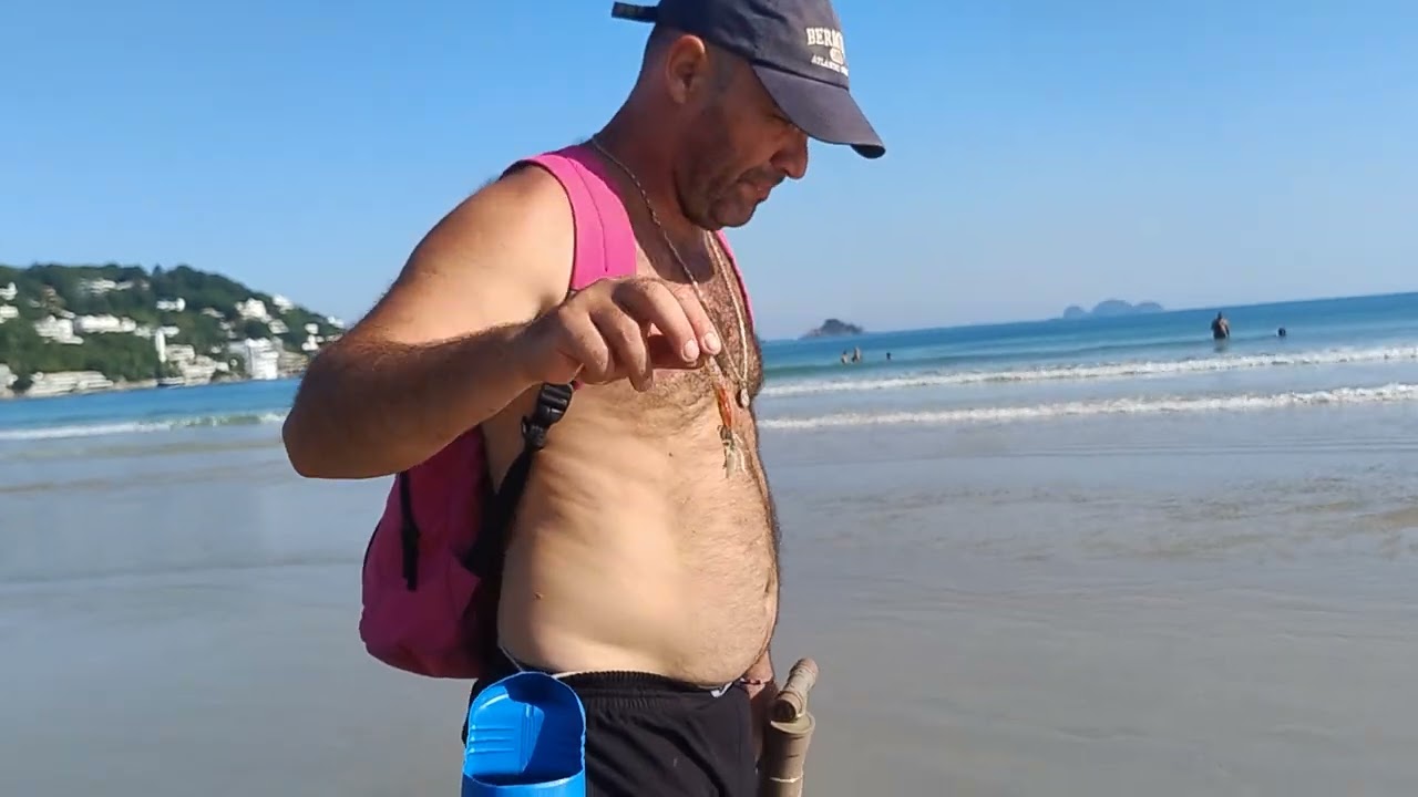 Como tirar isca corrupto na praia  para pescar