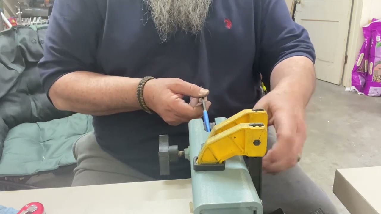 Abrasive Cord knife pin hole clean out.