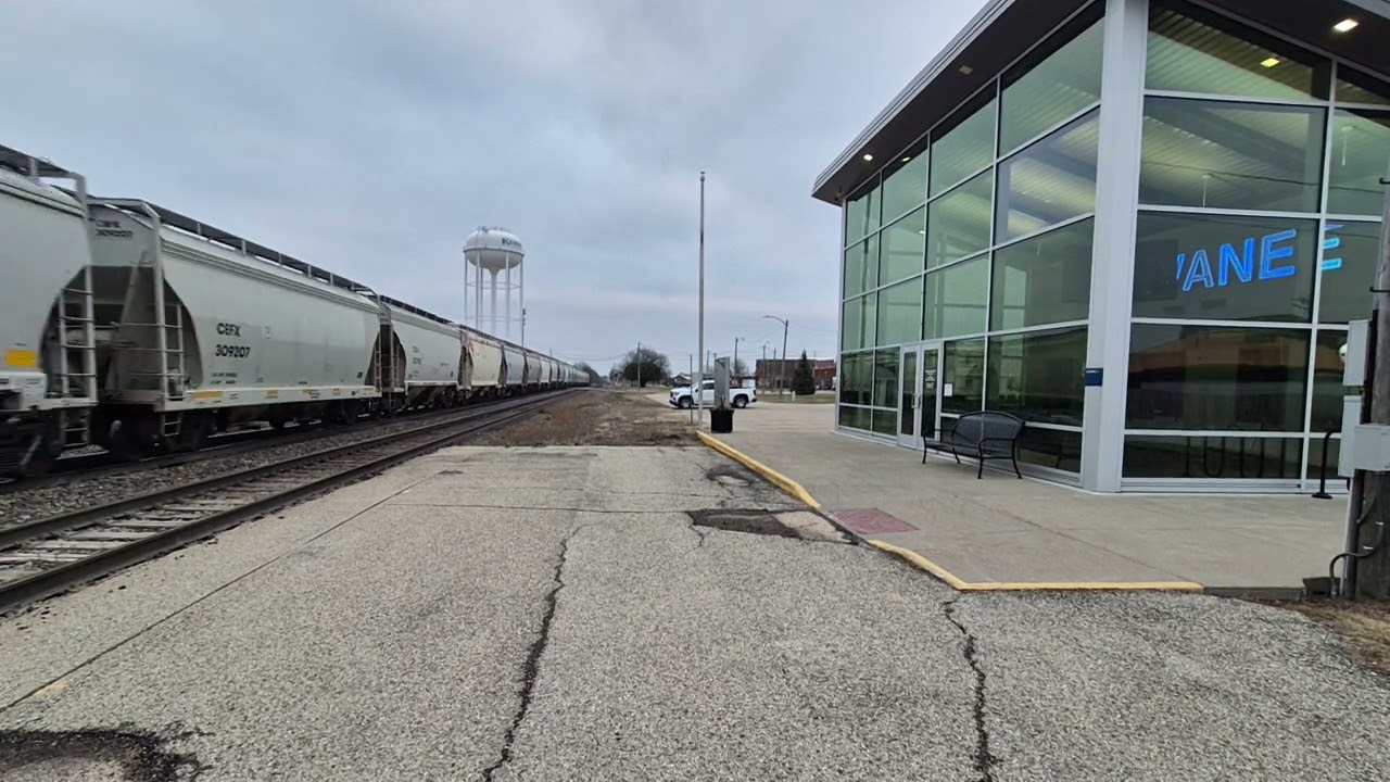 Freight train and Rare Amtrak had an old car and 4 engines 