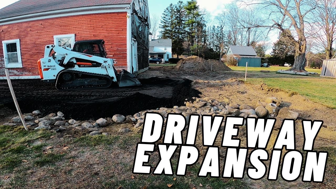Expanding a driveway with re-claimed asphalt for a turn around and more parking, with a Bobcat T-650