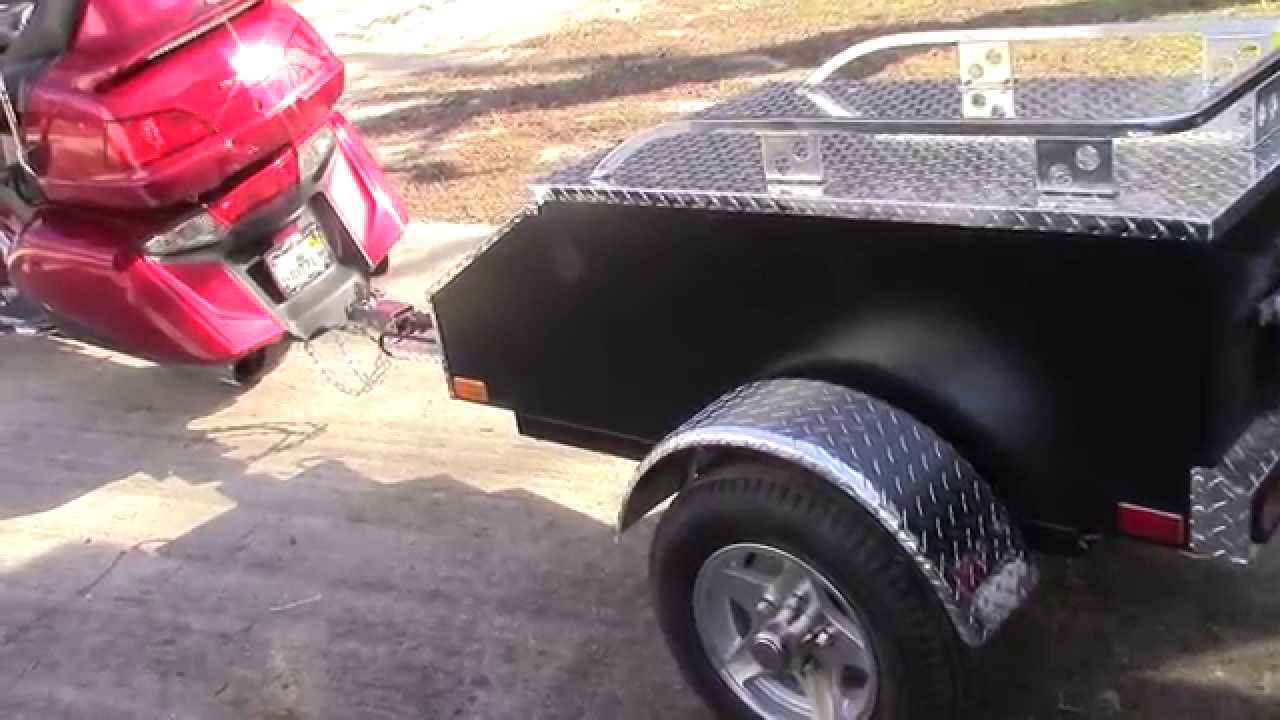 Pull a motorcycle trailer.