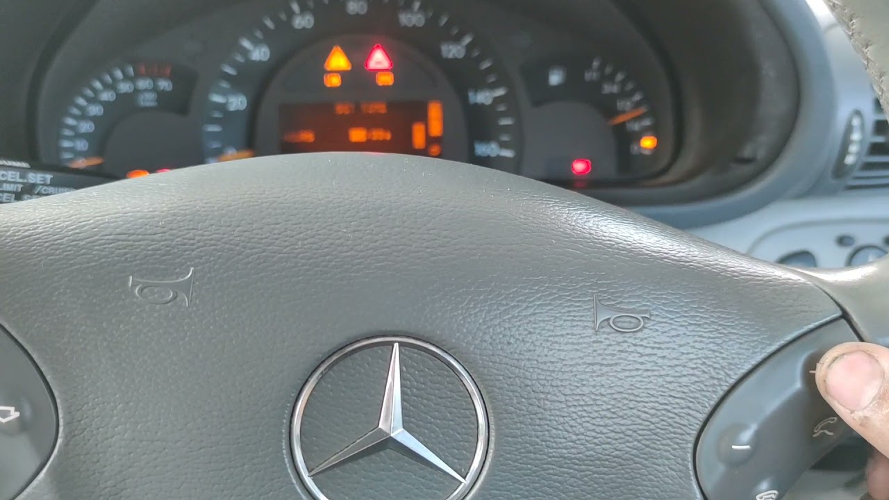 how to set clock on mercedes c class w203
