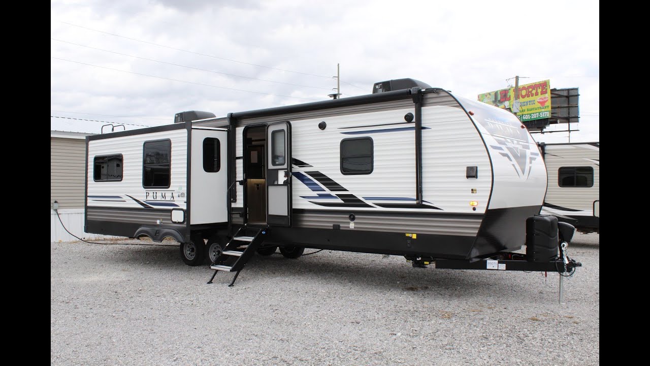 DOUBLE SLIDE REAR LIVING ROOM on this 2021 Palomino Puma 31RLQS