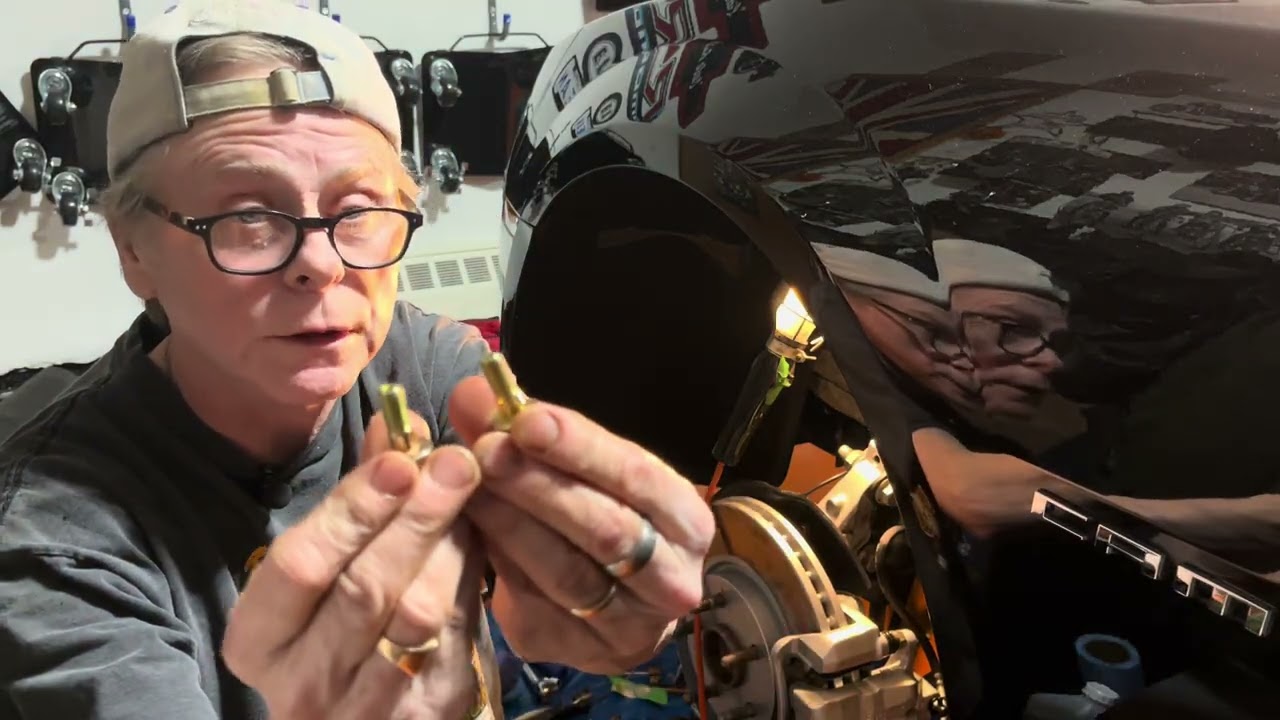 Installing the brake pads on drivers front disc