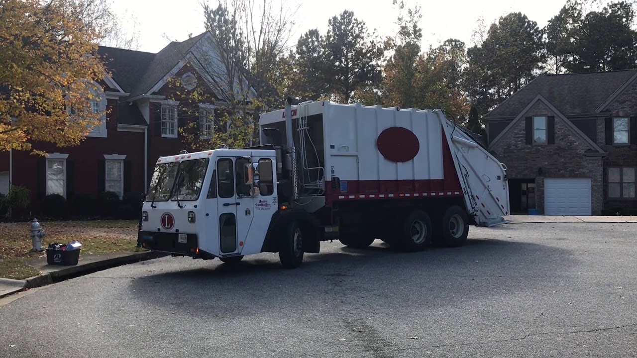 Latham Home Sanitation: CCC LET2 Crewcab Leach 2R2 Rear Load Garbage Truck