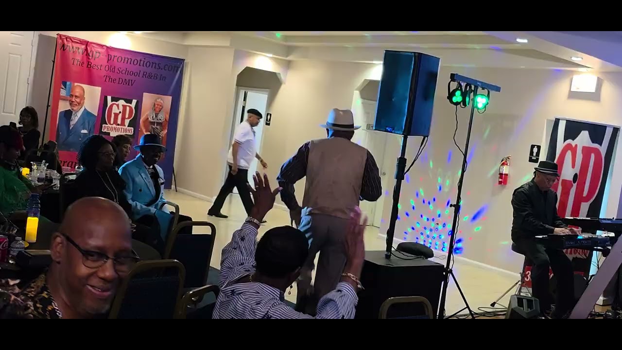 Gregory Cooper, backed by Afterthought Band, sings 