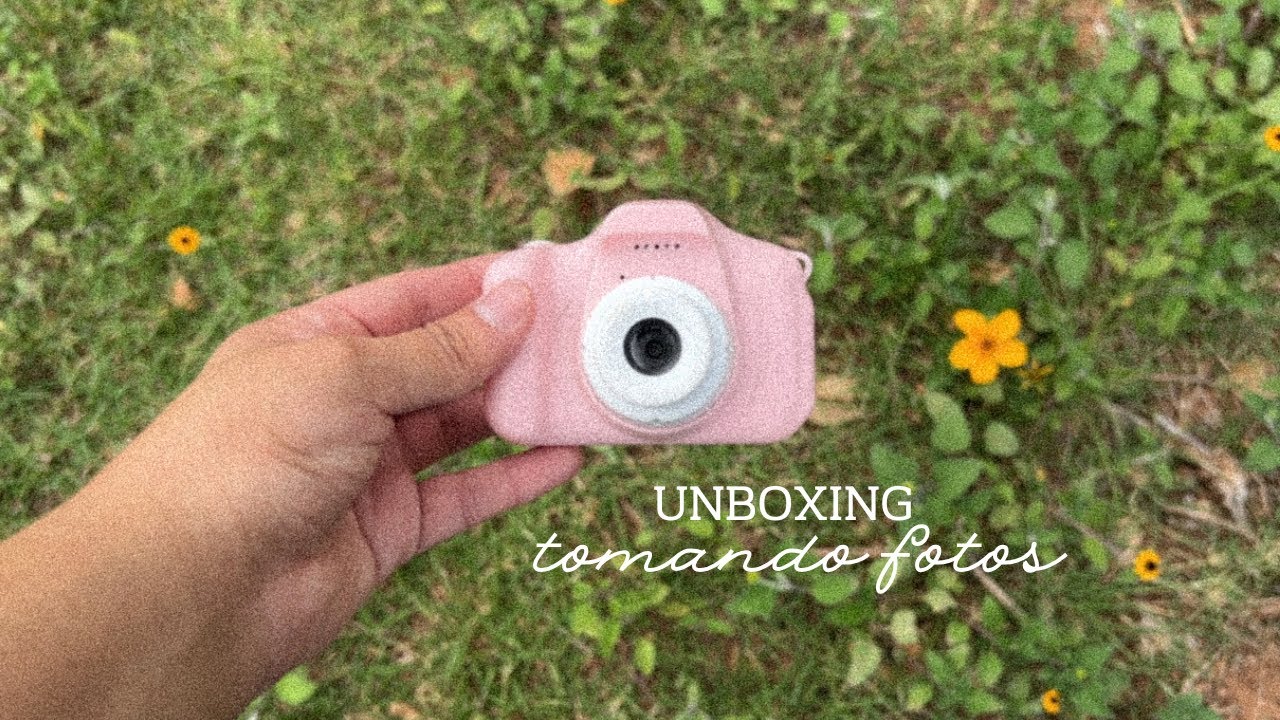 tomando fotos con una mini cámara
