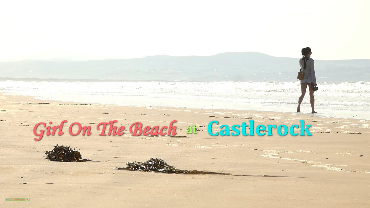 Girl On The Beach - Castlerock - Causeway Coast (N Irish beach walk scenery on film)