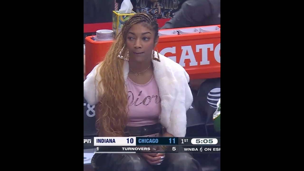 Angel Reese on the sideline with injury