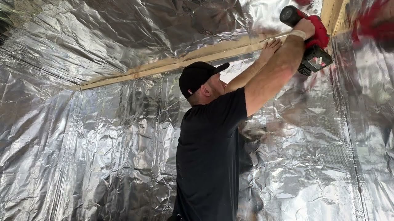 How to panel a Sauna - vapor barrier insulation strip install + bottom tile edge  (pre panel step)