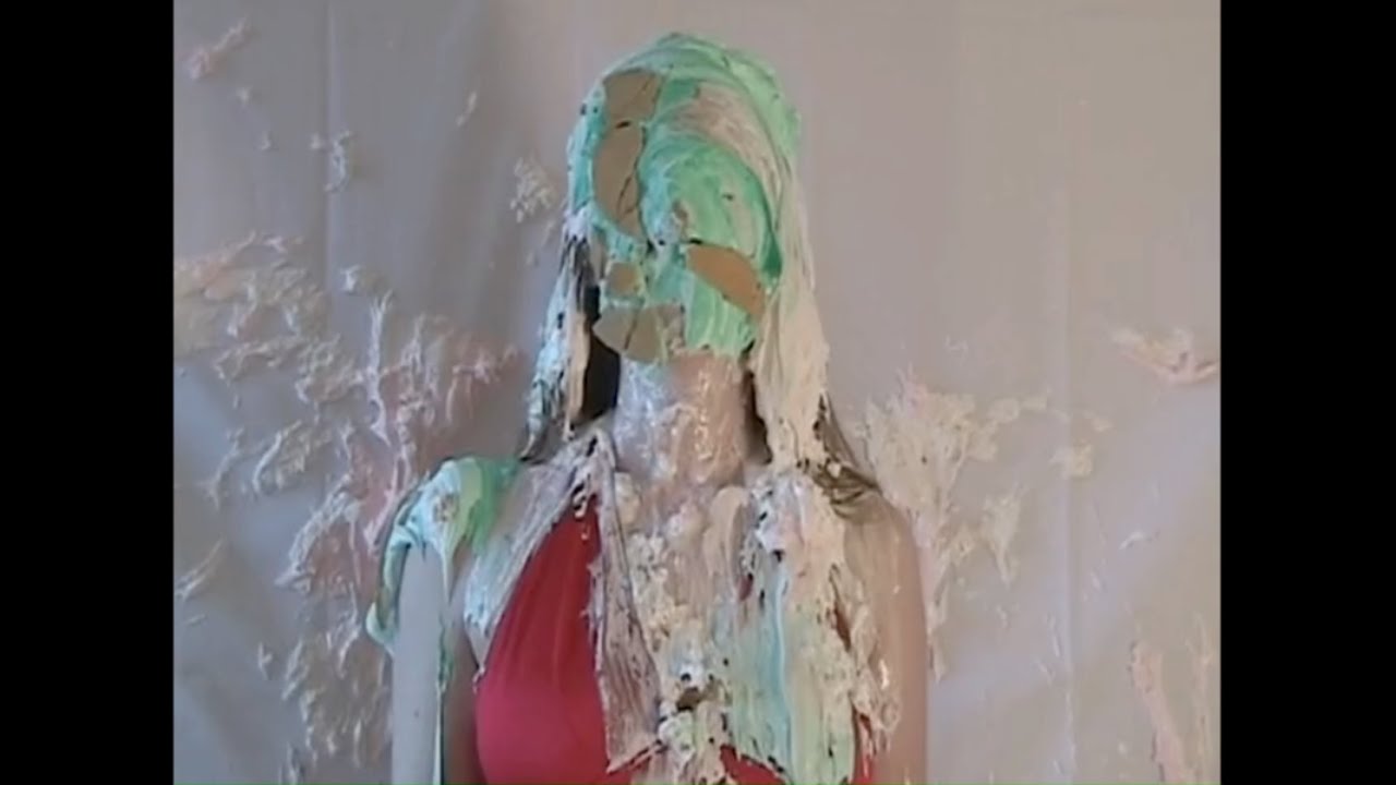Woman gets her face splattered with pies