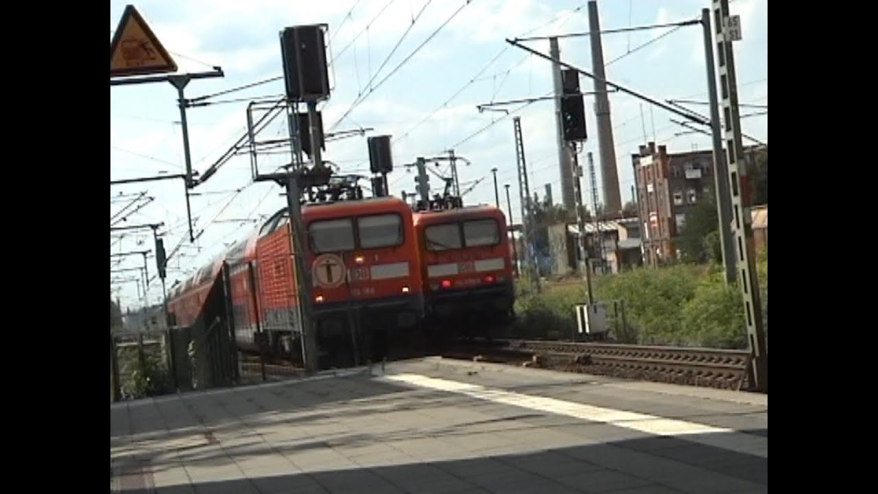 RE1 with DB 114 009 4 meets RE1 with DB 112 188 at the station  