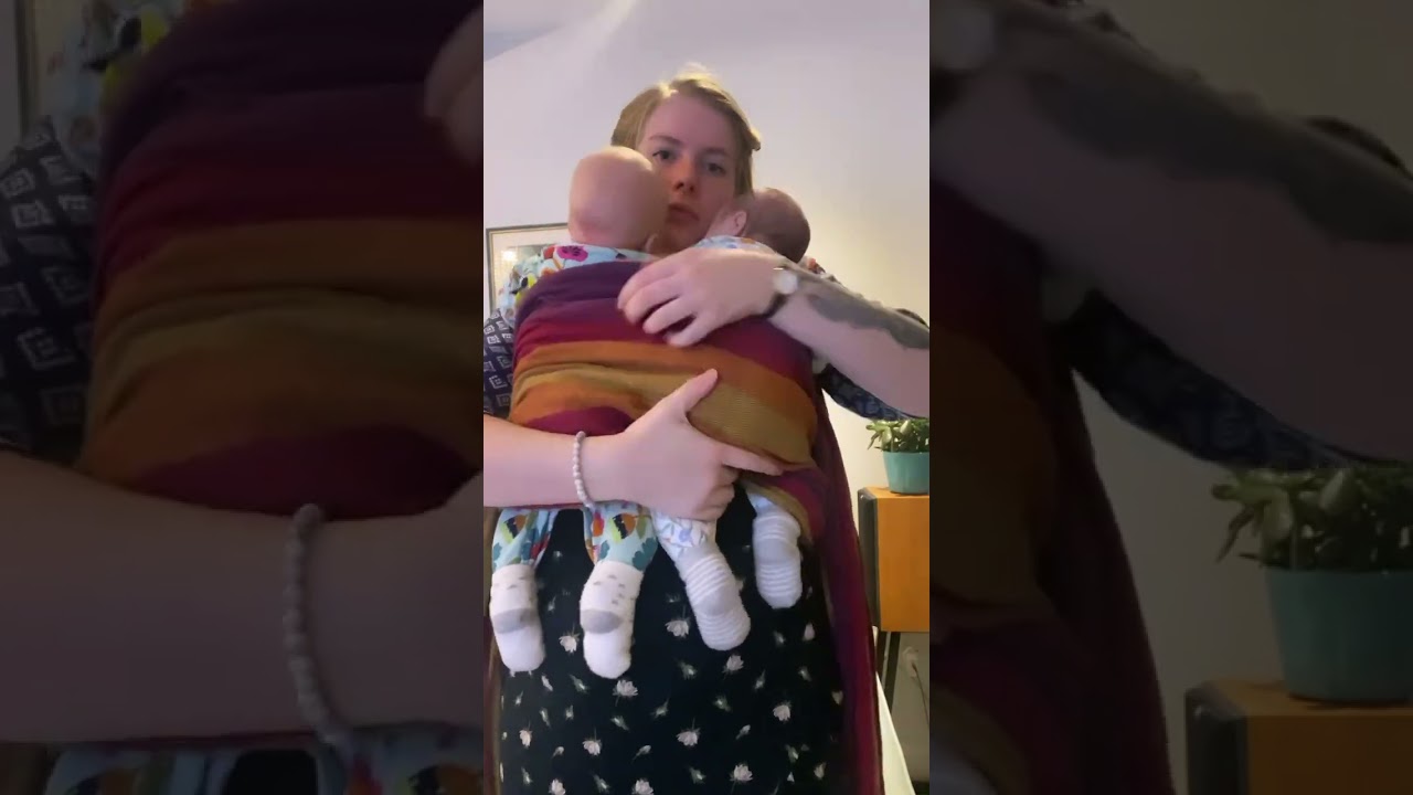 Tandem Carry with 7 week old twins in a woven wrap by Girasol Berlin