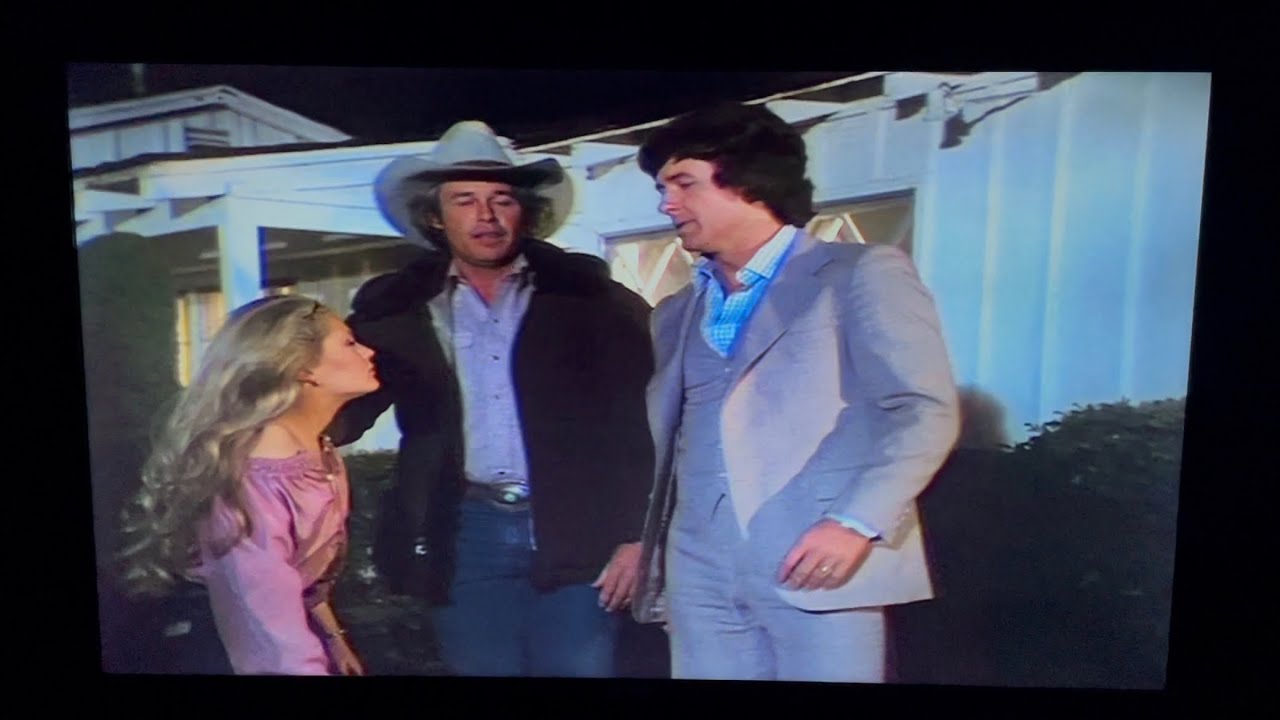 Dallas: Ray and Bobby pick Lucy up from a party.