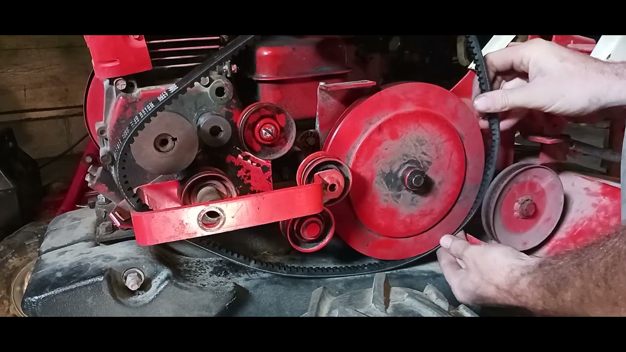 how to put a drive belt on a Gilson rear tine garden tiller and put tine belt on and adjust