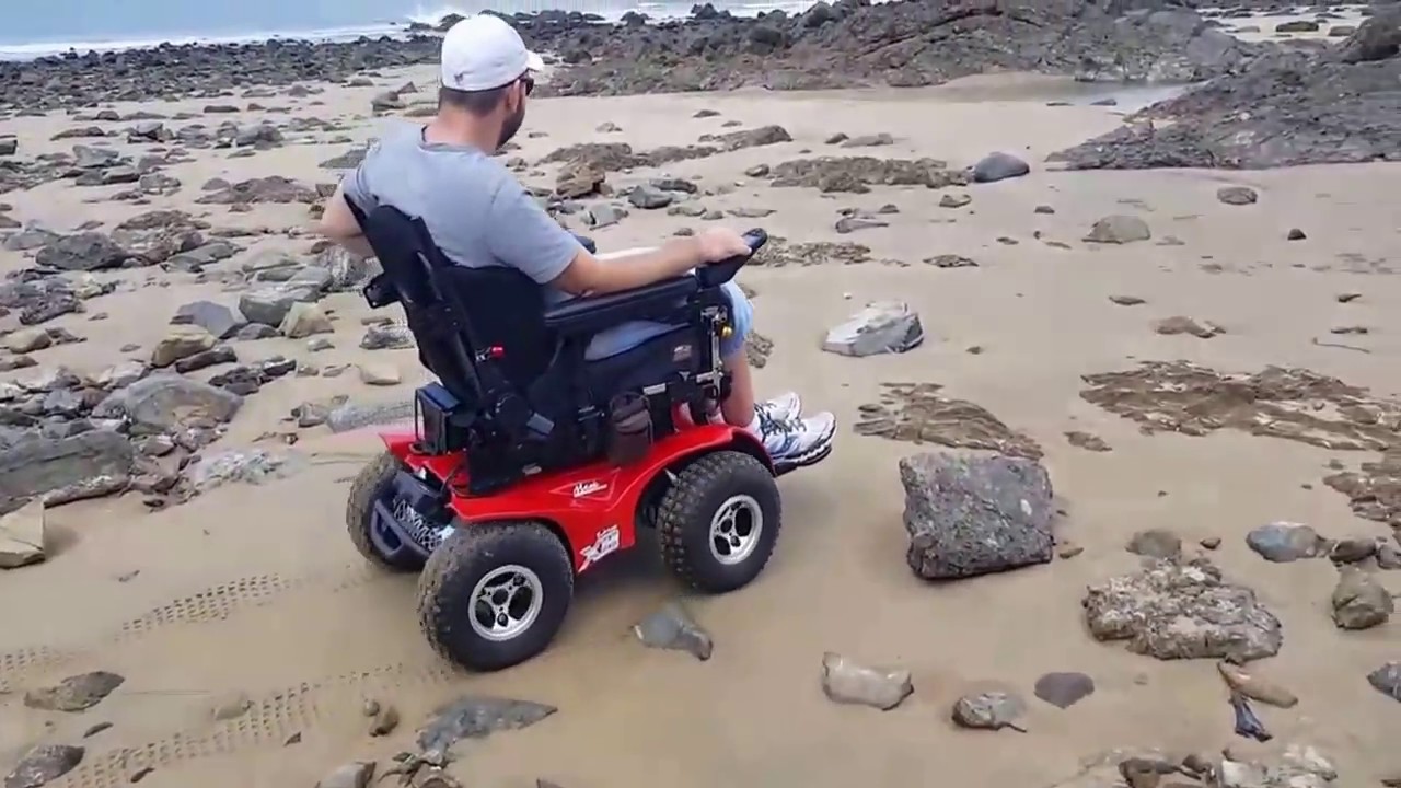Magic Mobility Extreme X8 4X4 wheelchair on the beach