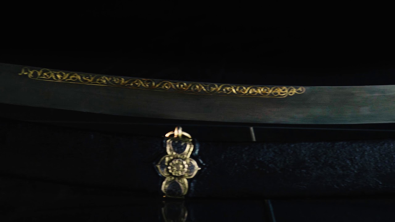 Ottoman silver-mounted and nielloed, gold-inlaid kilij with a nephrite grip