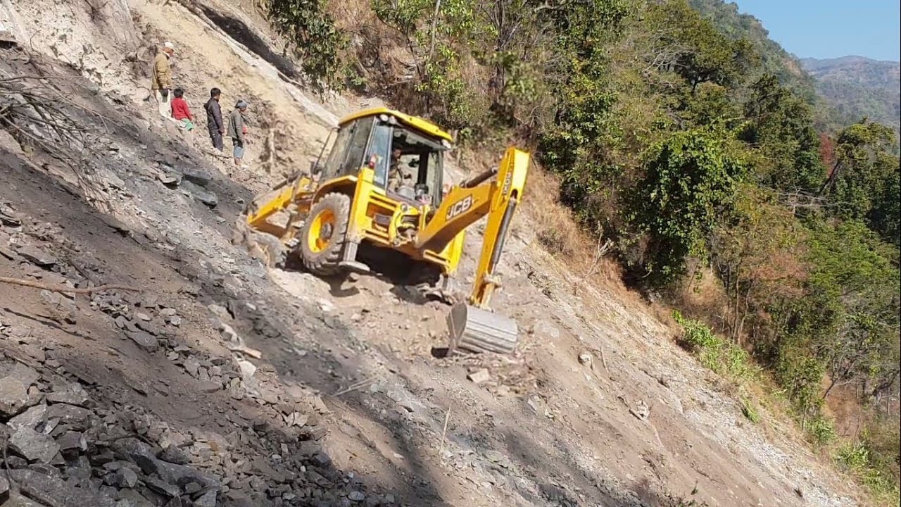JCB Backhoe-on Loose Soil and Steep Hill Cutting Hill Road Construction