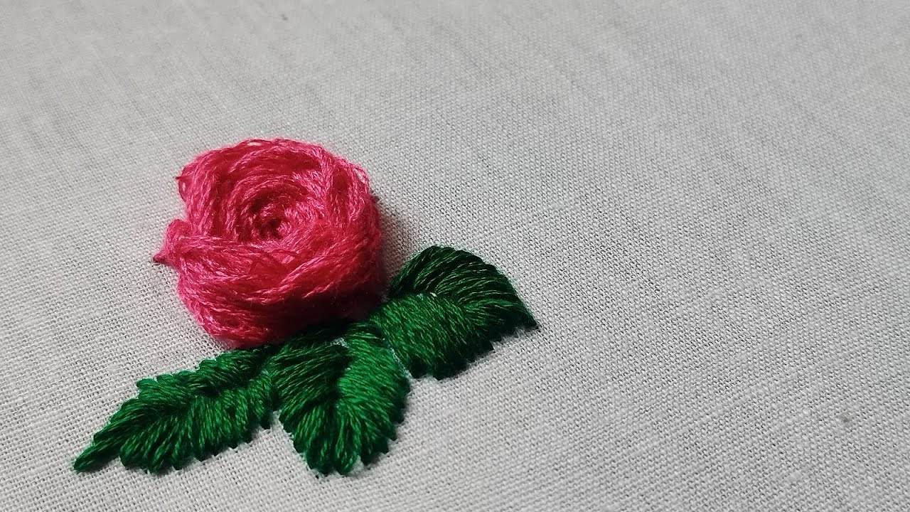 A simple yet beautiful pink thread flower stitched on fabric with love.#handbroidery #craft #viral 