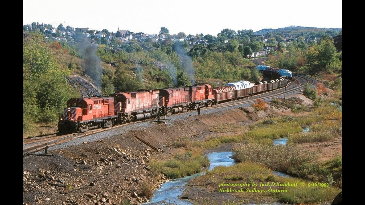 Four Canadian Pacific Alco's (MLW's) start on a heavy grade, on the Nickle sub...