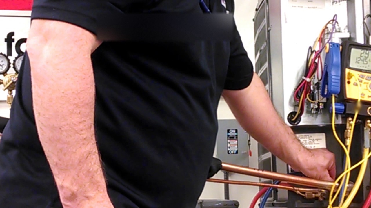 Pressure testing an HVAC system with Nitrogen (Re-touched)