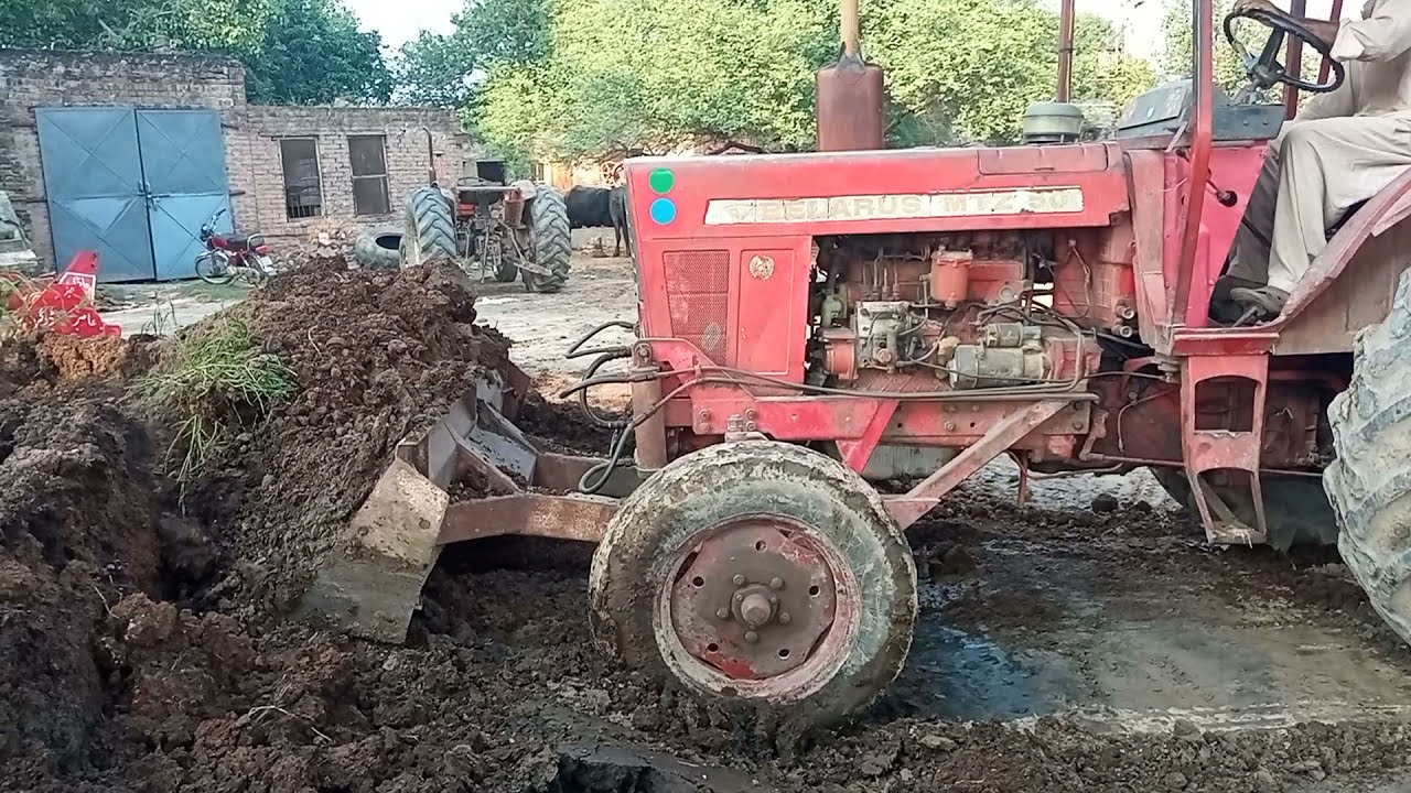 Unveiling the Power and Performance of the Belarus Tractor MTZ 50 with front blade in Pakistan