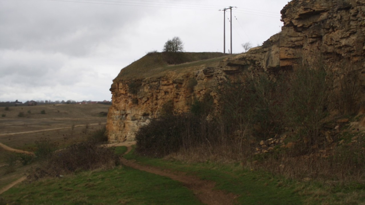 DISUSED QUARRY IN LINCOLN: (NEARLY FELL DOWN STEEP SLOPE.)