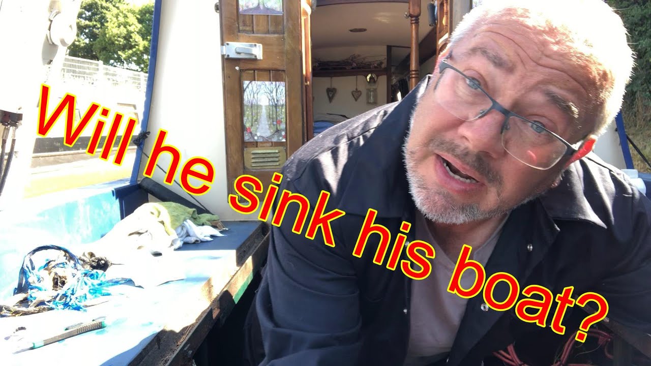 Repacking the stern gland on a narrowboat whilst still in the water. 137