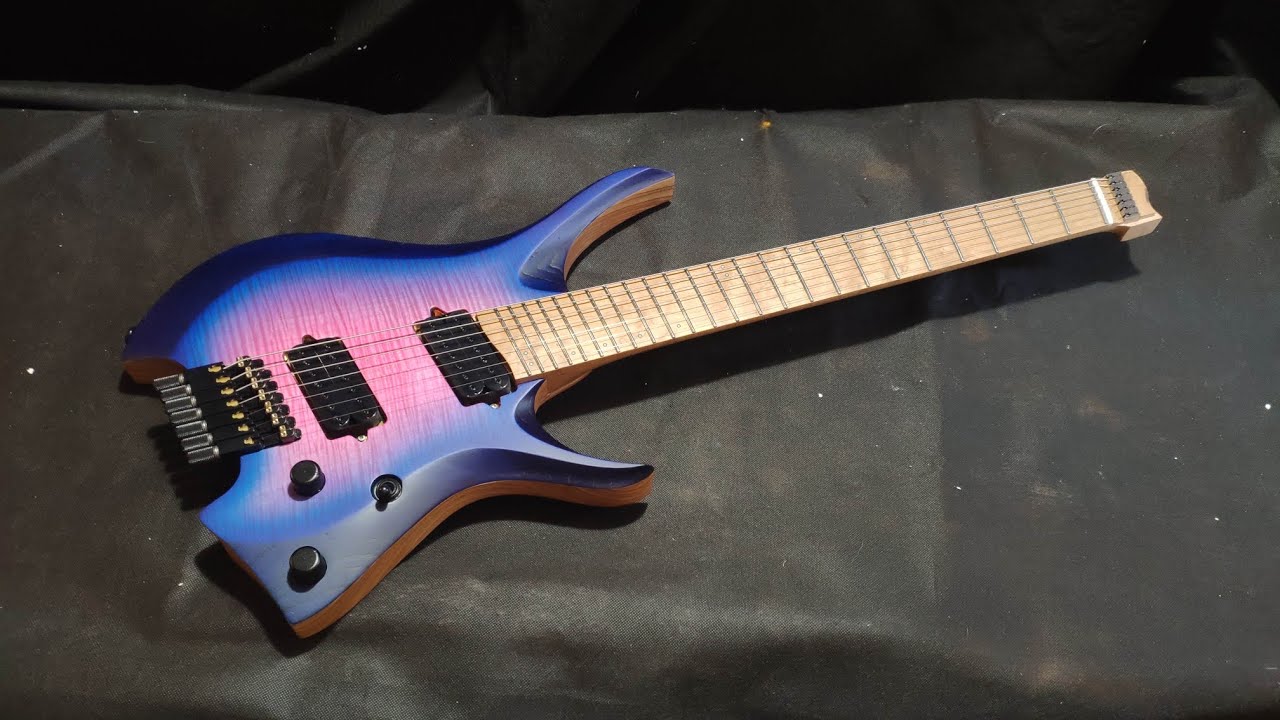 Обзор сборки мультимензурной семиструнной электрогитары NK-Guitars розово-синий бёрст HH номер 154