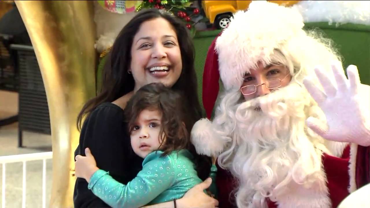Sports anchor plays Santa Claus
