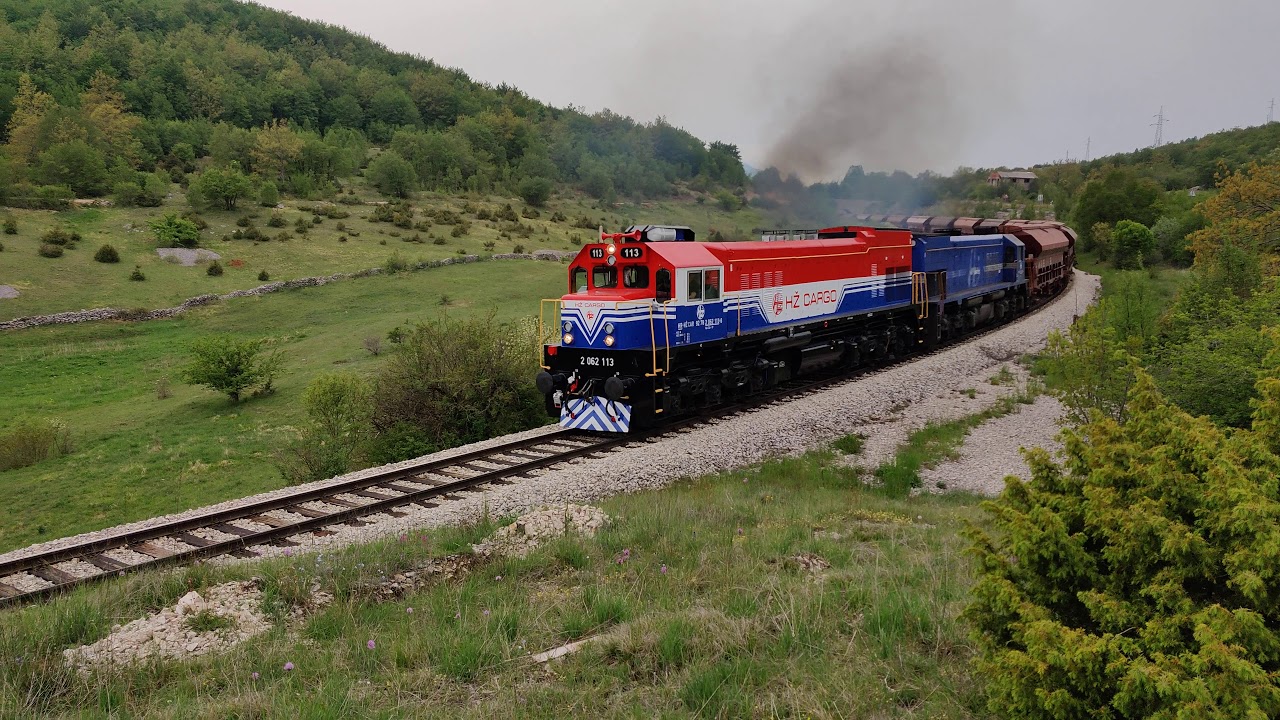 Freshly overhauled 2062 113 leading a loaded freight train uphill