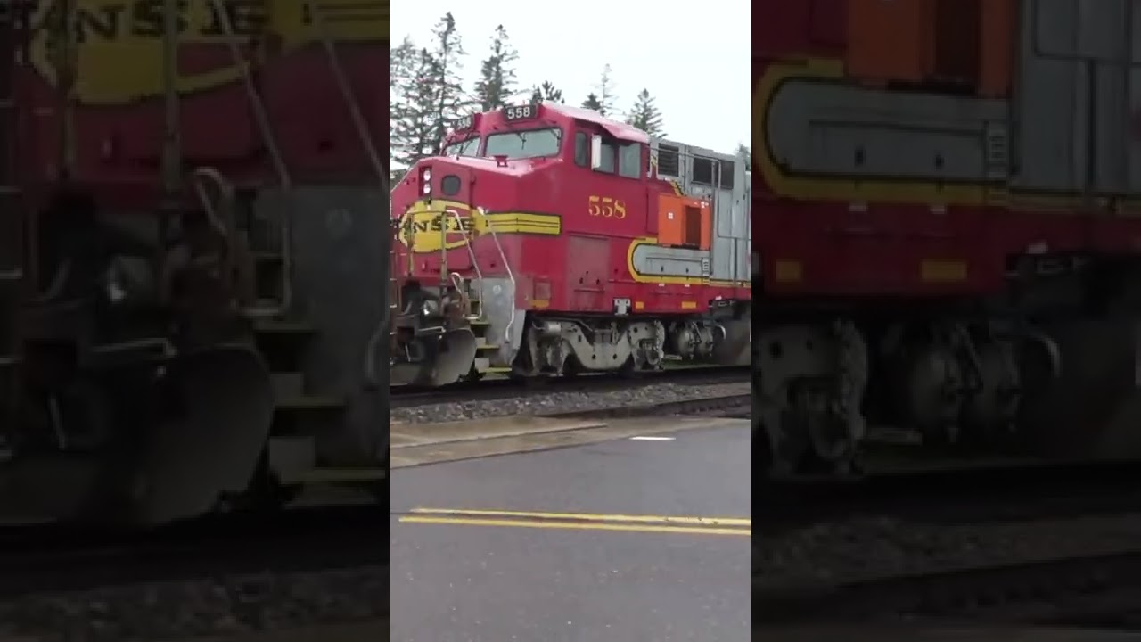 Watch this awesome ex ATSF duo pull a short work train in the pouring rain! #shorts