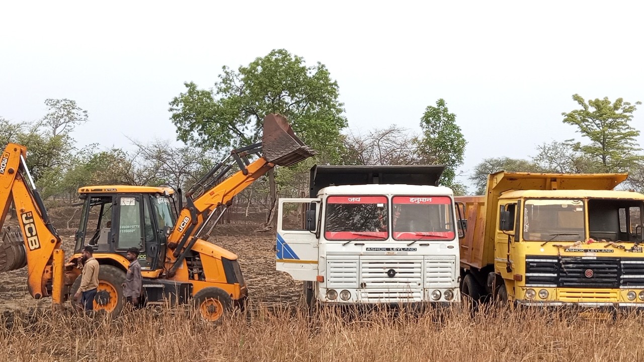 Loading Mud with JCB Backhoe and Ashok Leyland Truck!