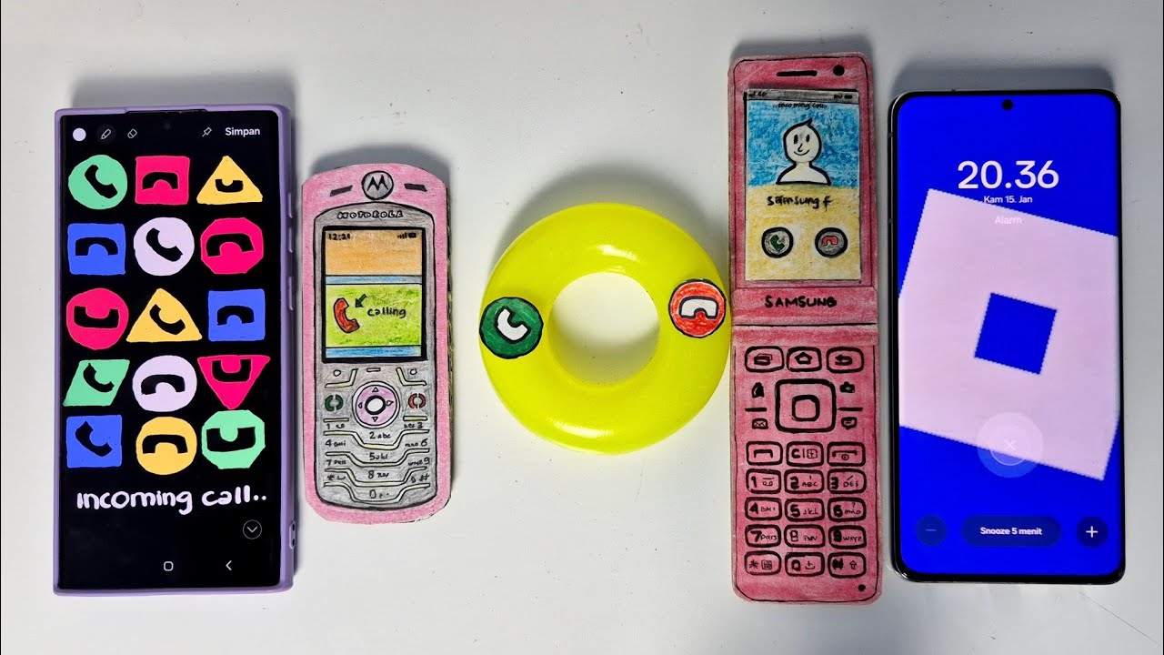 A lot of buttons/ MOTOROLA L6/circle yellow/samsung folder/ROBLOX alarm, incoming calls