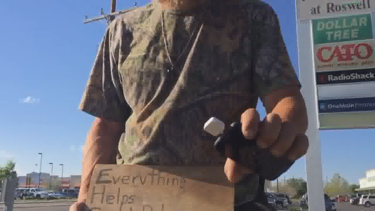 High tech Roswell panhandler gets buzz