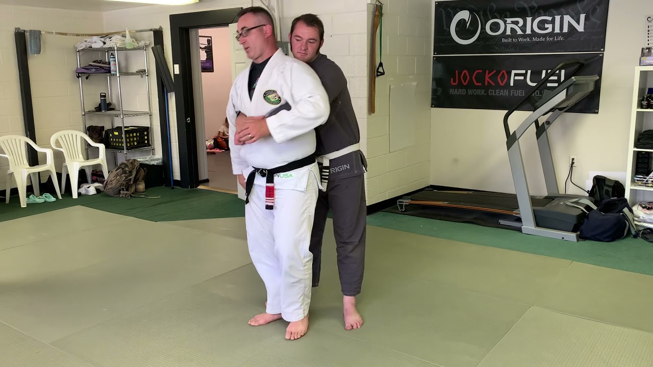 Escape Rear Bear Hug (Under Arms)