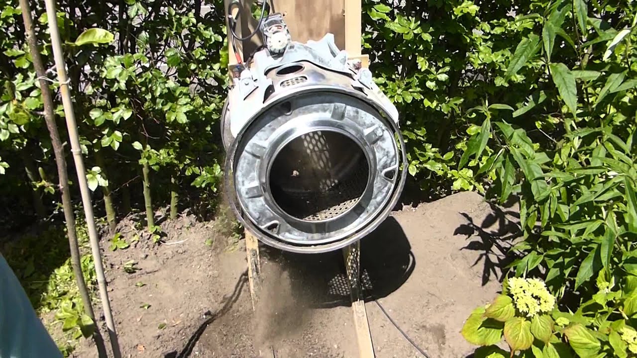 Tuinzeef onkruid. garden weed. Compost sifter, ratary tumbler.
