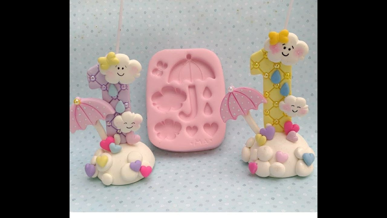 Vela de biscuit tema chuva de bênçãos ou chuva de amor