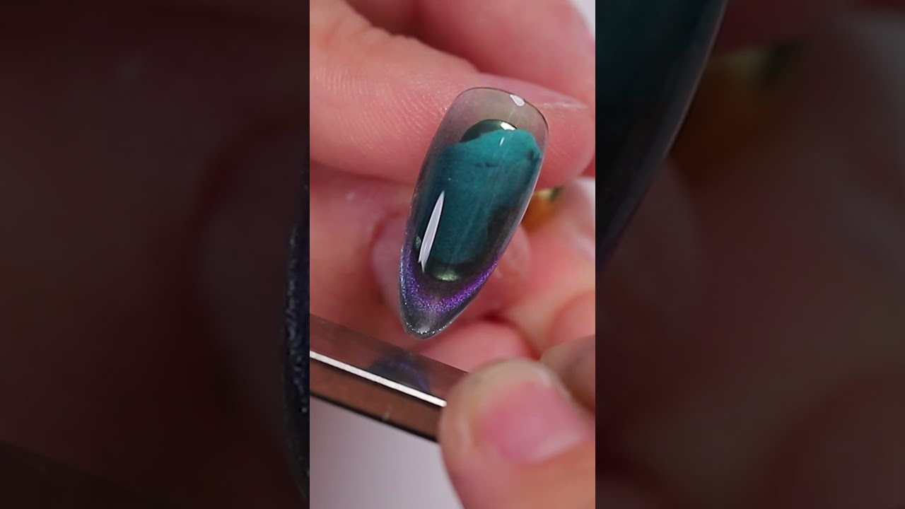 Excellent is a multichrome magnetic in the infinity ♾️ design  #nails #cateyegel