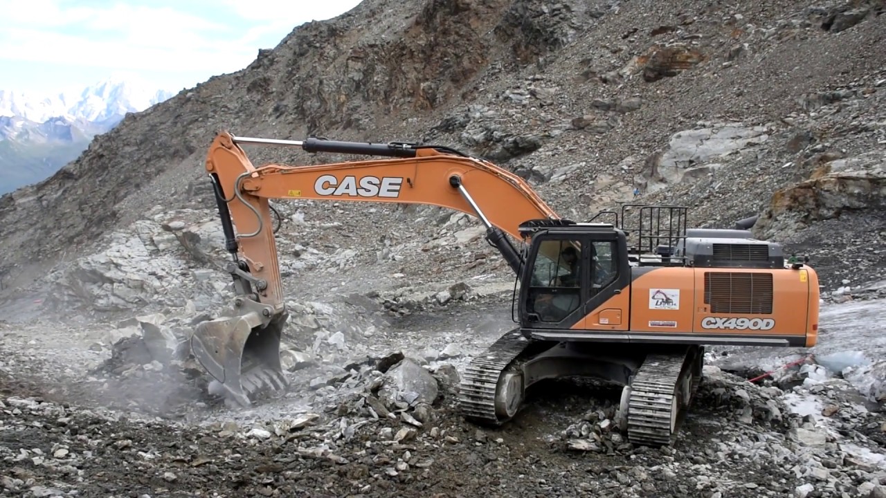 Case CX490D and Caterpillar D9R in French Alps
