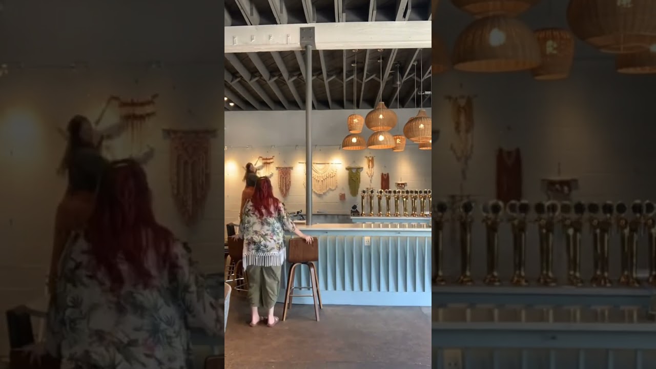 Gallery wall setup at Hop Atomica in Savannah! Macrame wall hangings, fiber art
