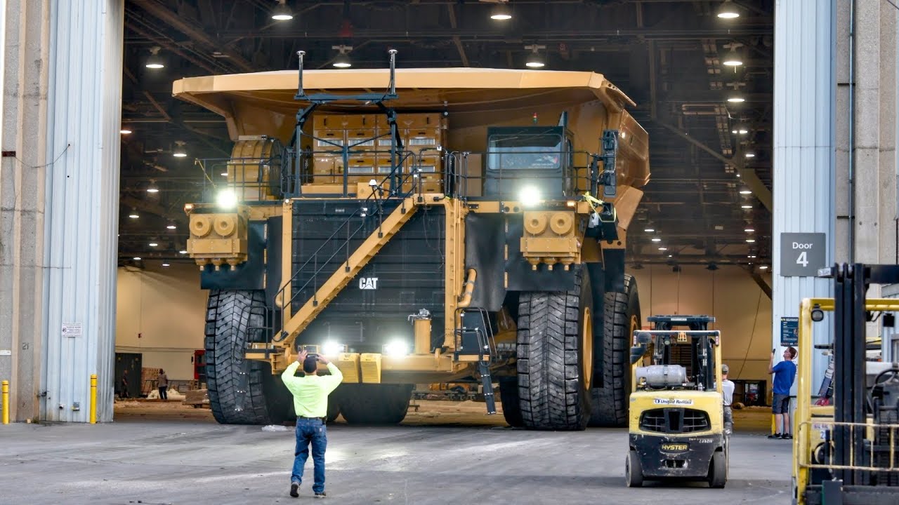 Cat's Largest Dumptruck Leaving MINExpo 2024