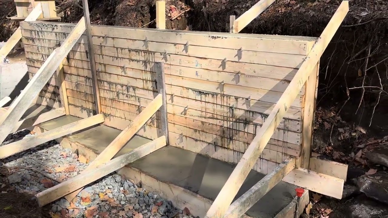 Concrete retaining wall with Simpson WT8 ties—All Access Construction method