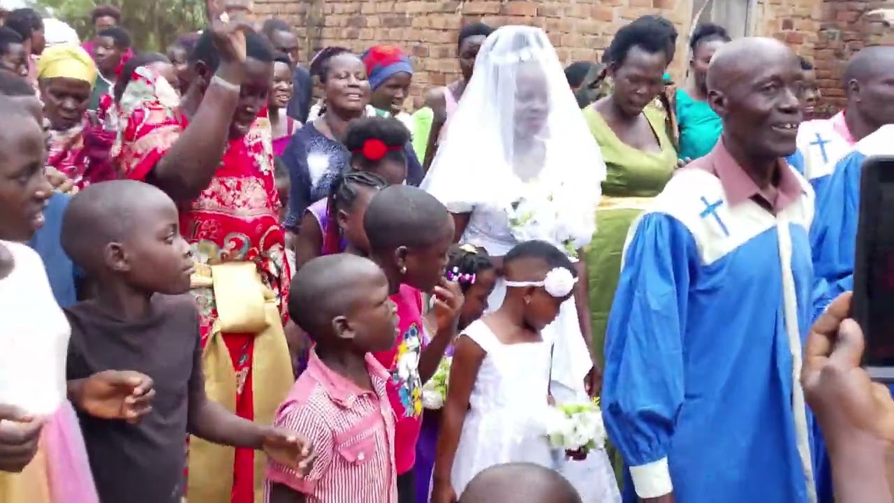 Part, 2 , Mrs edirisa being welcomed at church for wedding