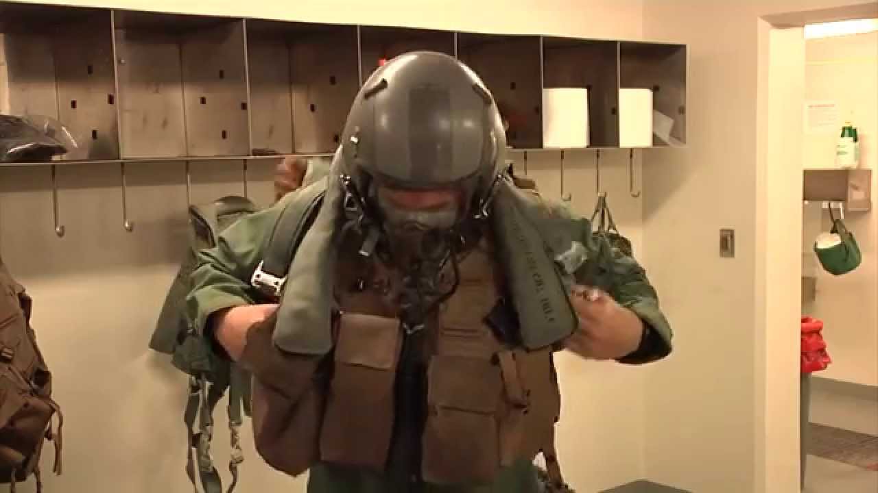 Pilots Don MOPP Protective Gear - 25th Fighter Squadron