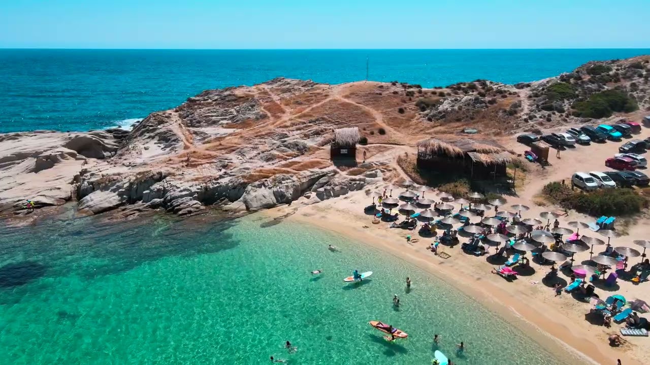 Kriaritsi Hawaii beach Sithonia 2025 Chalkidiki piękna plaża turkusowa woda Grecja