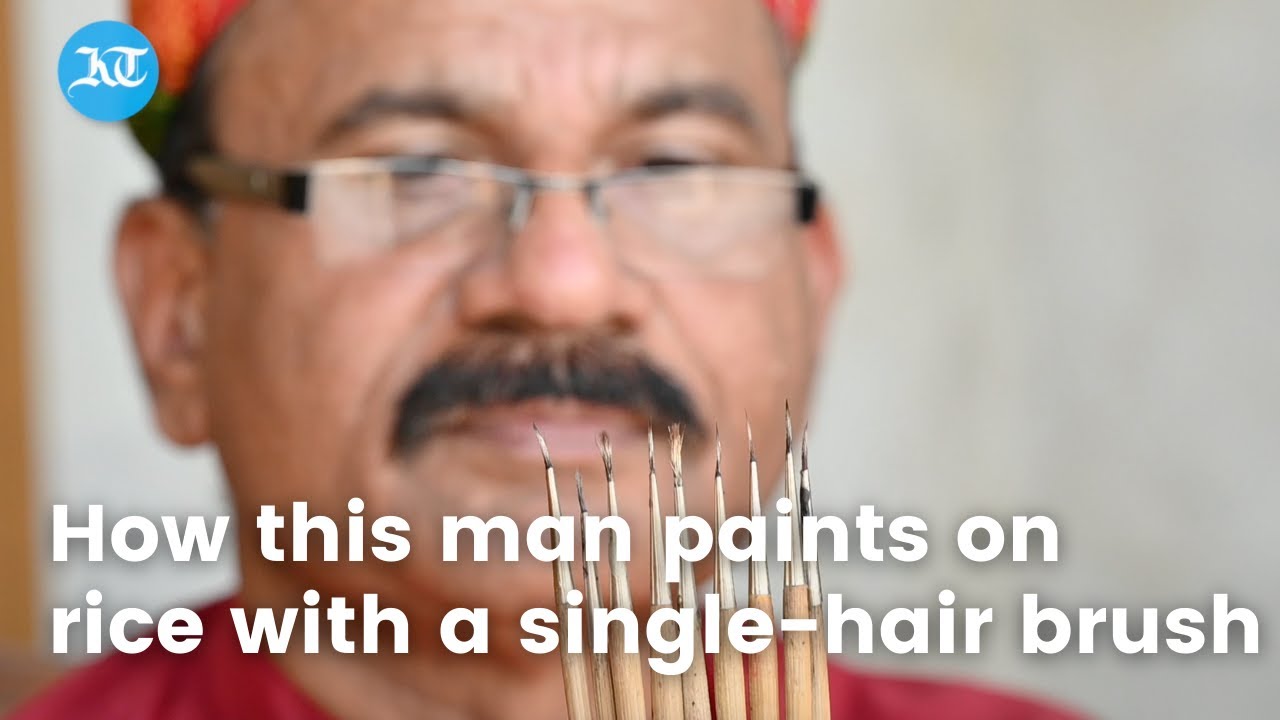 How this man paints on rice with a single-hair brush