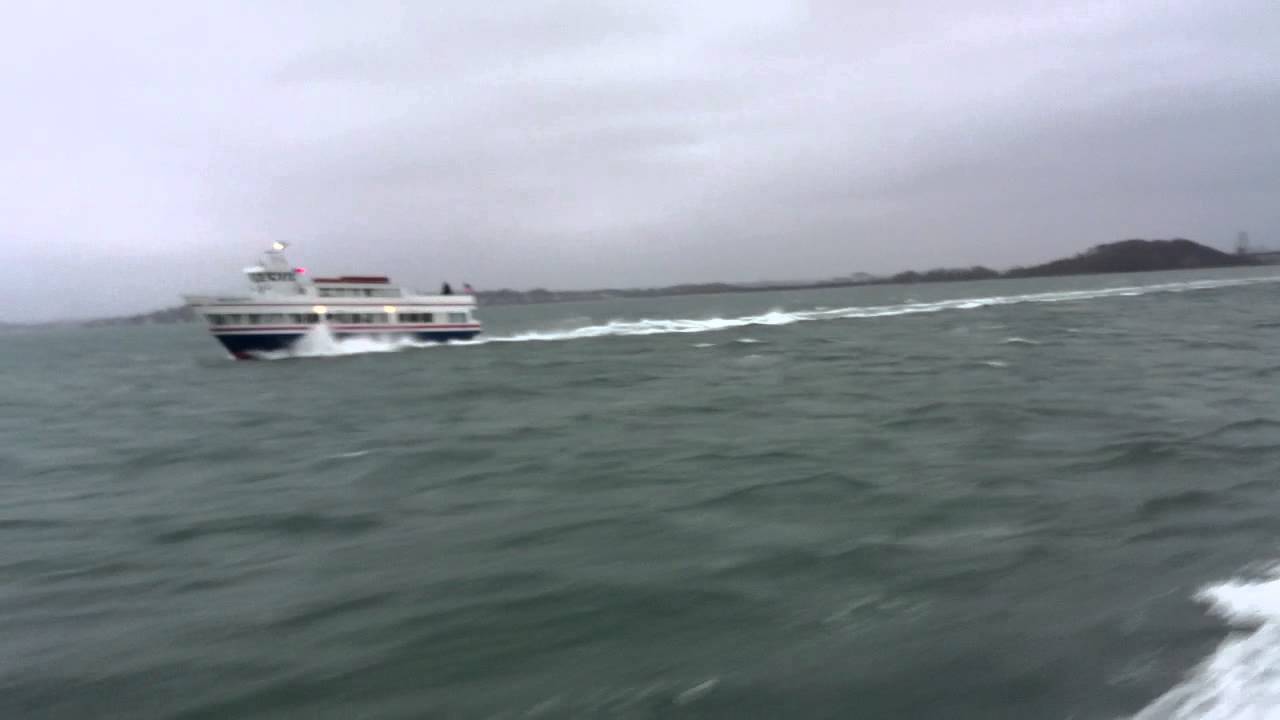 VIII blowing by 20 knot commuter boat