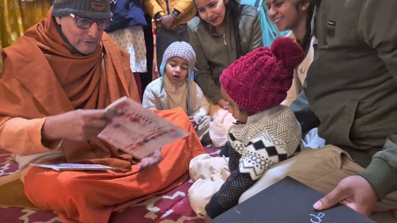 ChuChu goes to celebrate Saraswati puja and his first letters with Swami Annapurnananda