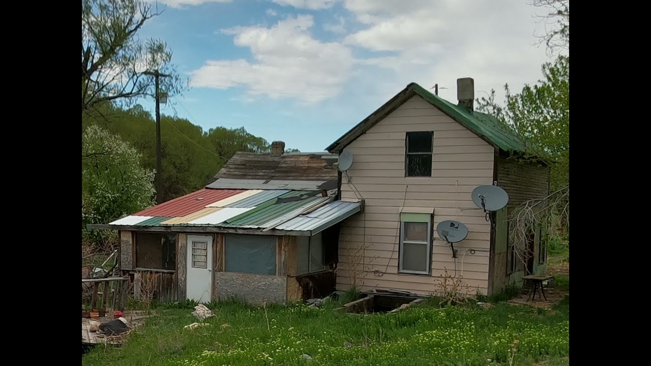 Radically Abandoned Farmhouse In Eastern Oregon.  Creepy Cellar under house.